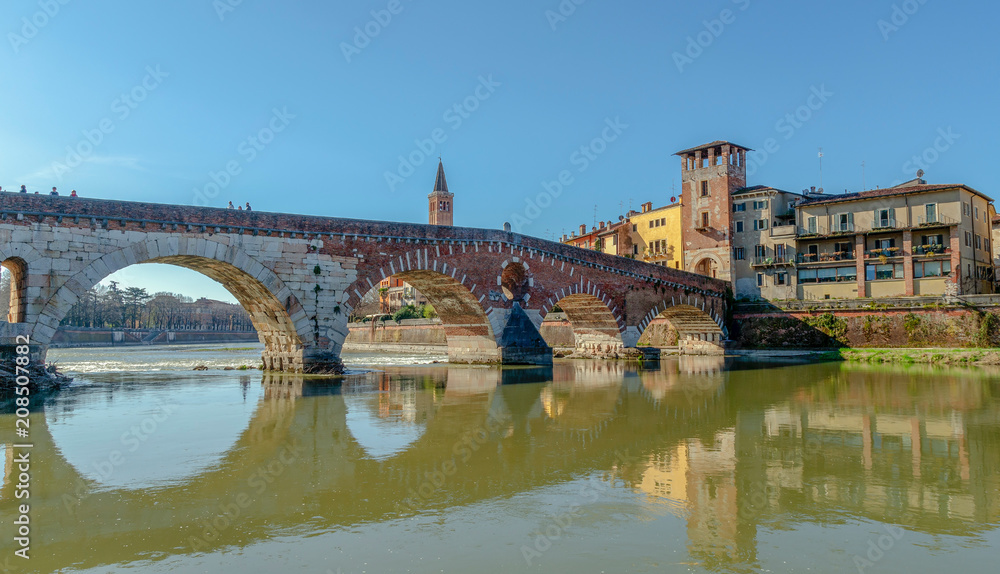 View of medieval bridge of Ponte Scaligero, near Castelvecchio, Verona, Italy