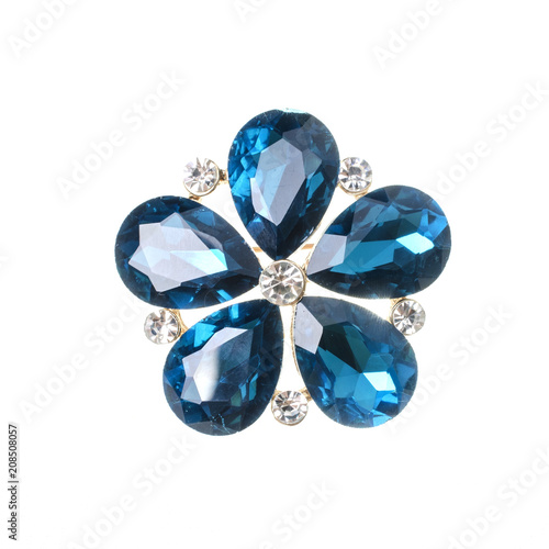 brooch flower with blue stones isolated on white