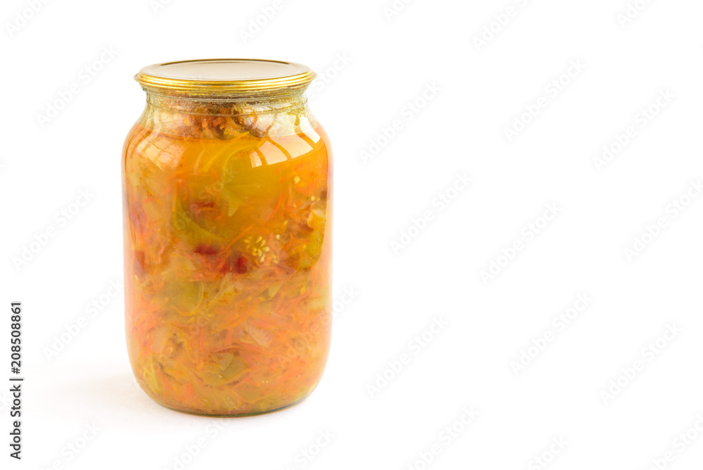Homemade pickled salad of tomato, pepper, onion and carrot in glass jar isolated on white background. Homemade pickled salad of tomato, pepper, onion and carrot in glass jar isolated on white background.