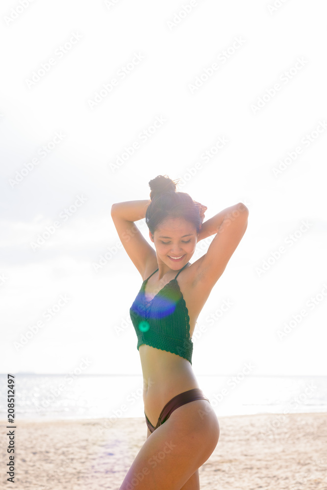 Young beautiful Asian tourist woman enjoying vacation Young beautiful Asian tourist woman enjoying vacation