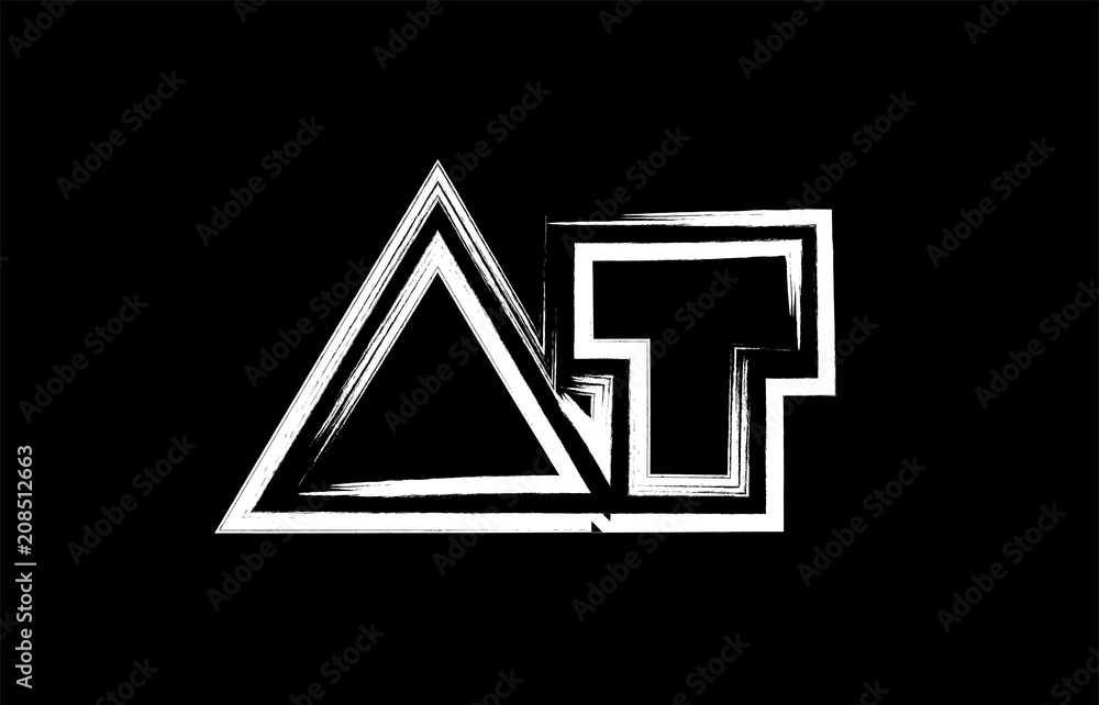 grunge black and white alphabet letter combination at a t logo icon design grunge black and white alphabet letter combination at a t logo icon design