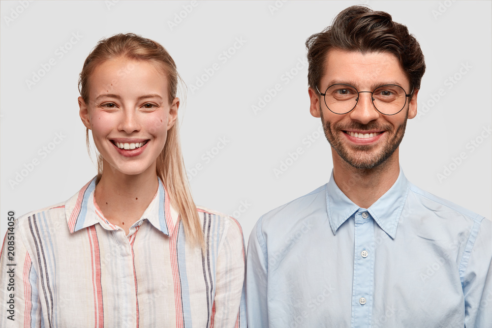 Cheerful students have broad smiles, wear elegant shirts, happy to finish project work, achieve great results in studying, enjoy togetherness and cooperation. Friendship and happiness concept Cheerful students have broad smiles, wear elegant shirts, happy to finish project work, achieve great results in studying, enjoy togetherness and cooperation. Friendship and happiness concept