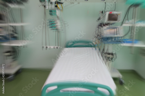 Blurred hospital room with empty bed ready for admission of patient  unfocused background
