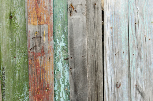 Old rustic fence of color boards
