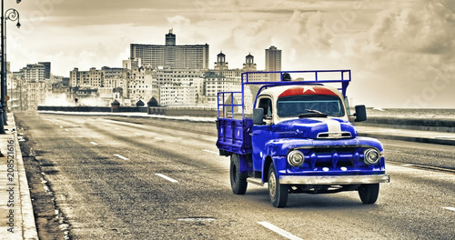 view of a old classic truck in the malecon of havana © javier