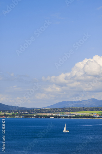 Russia city Gelendzhik yacht on the sea sky and clouds