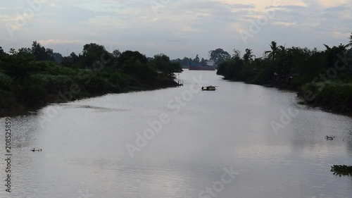 person sailing simple boat