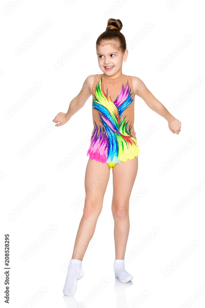The gymnast prepares to perform the exercise. The gymnast prepares to perform the exercise.