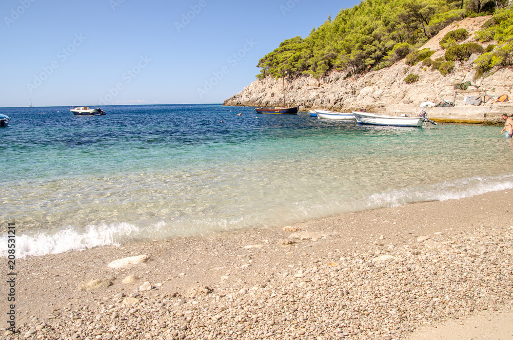 beach and sea in croatia, cristal water of croatia's seaside during summer,  dalmatia.