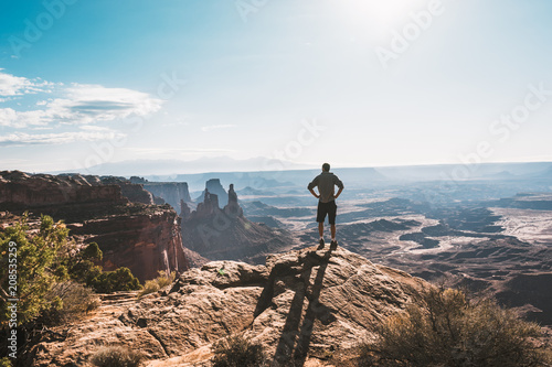 young man with Magnificent view of Canyonlands, Utah, USA.