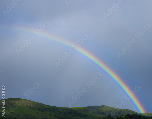 Fototapeta Naklejka Na Ścianę i Meble -  Colorful rainbow in the sky of the Basque Country