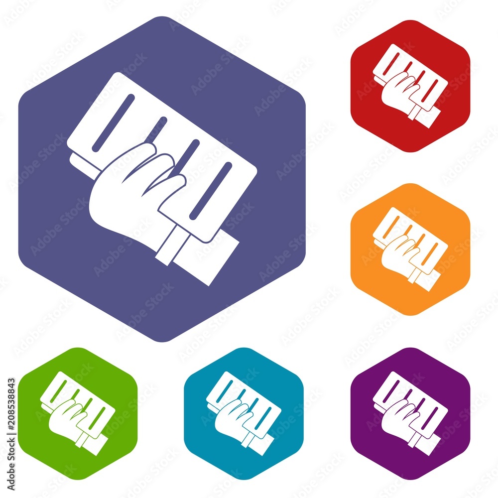 Brick in a hand icons set hexagon isolated vector illustration Brick in a hand icons set hexagon isolated vector illustration