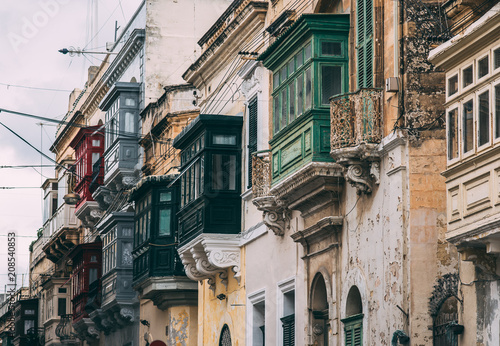 Street view in Birgu with traditional balconies, Malta
