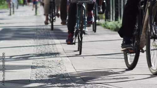 Wallpaper Mural Bicycles Traffic In The City. Slow Motion Shot Of Multiple Bicycle Riders Cycling On A Bicycle Lane On The Sidewalk. Torontodigital.ca