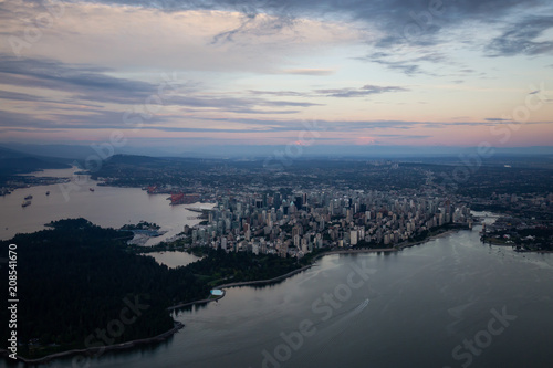 Aerial view of Downtown City during a vibrant cloudy sunset. Taken in Vancouver, British Columbia, Canada. © edb3_16