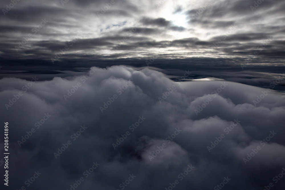 Aerial cloudscape view of the puffy clouds. Taken North of Vancouver, British Columbia, Canada.