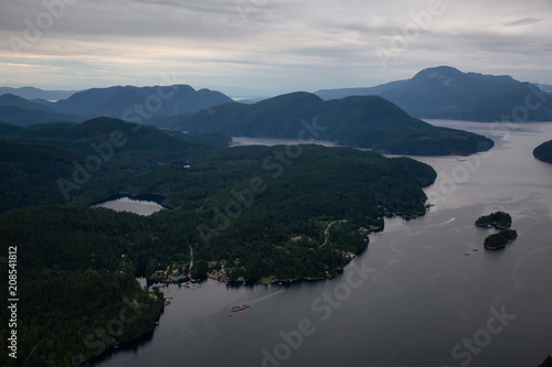 Aerial view of Skookumchuck Narrows during a vibrant cloudy sunset. Taken in Sunshine Coast  Northwest of Vancouver  British Columbia  Canada.
