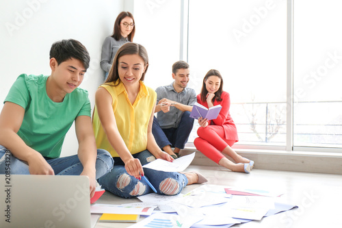 Young team working with mar...