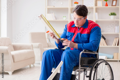 Disabled man measuring with meter