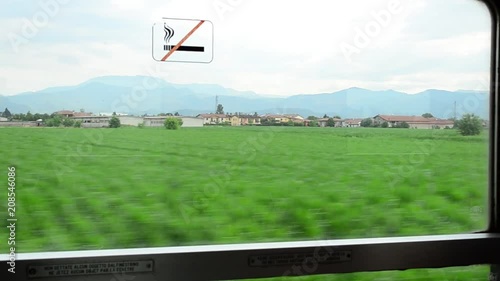  View on the fields and vineyards from high-speed train Milan - Venice photo