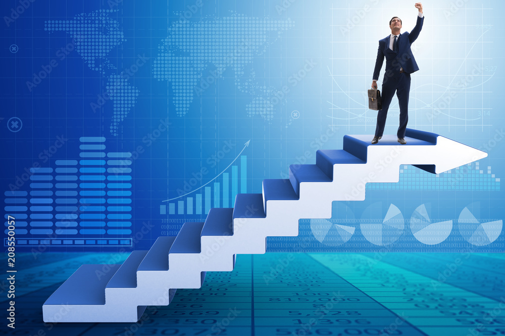 Businessman climbing career ladder in business concept Businessman climbing career ladder in business concept