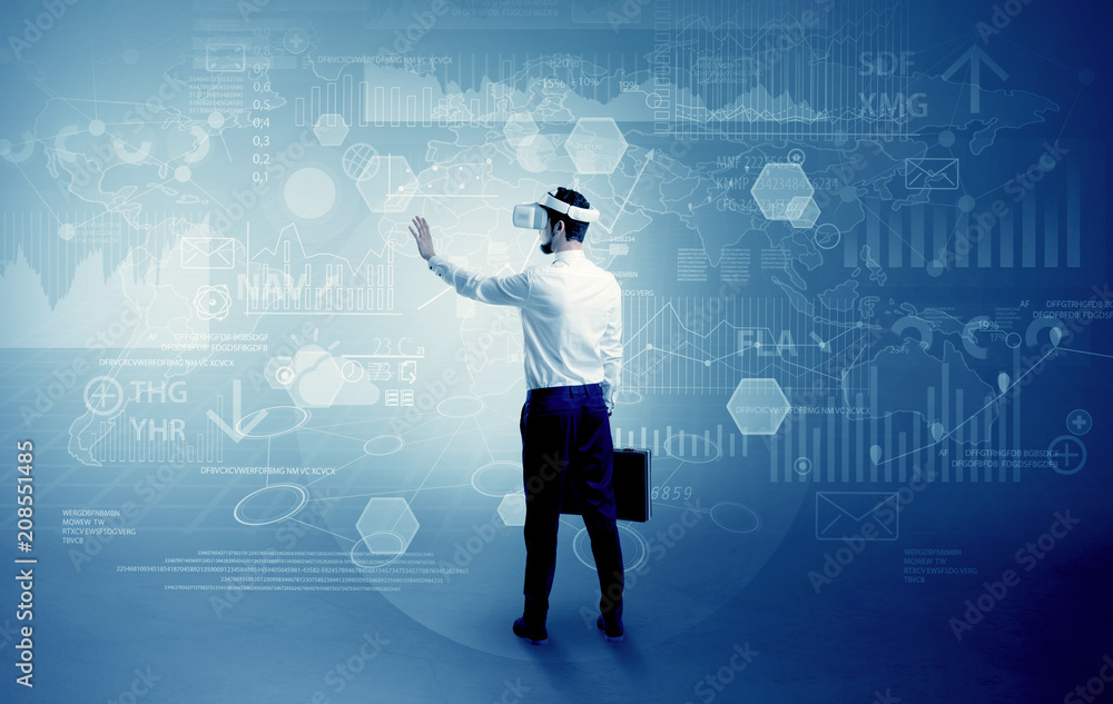 Businessman checking 3d reports and datas with vj glasses
Businessman checking 3d reports and datas with vj glasses