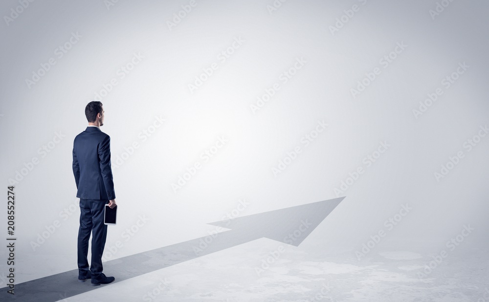 Man with object in his hand on the direct way to success Man with object in his hand on the direct way to success