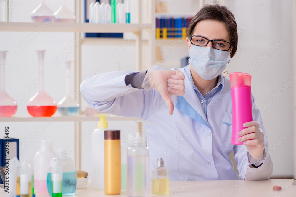 Lab chemist checking beauty and make-up products Lab chemist checking beauty and make-up products