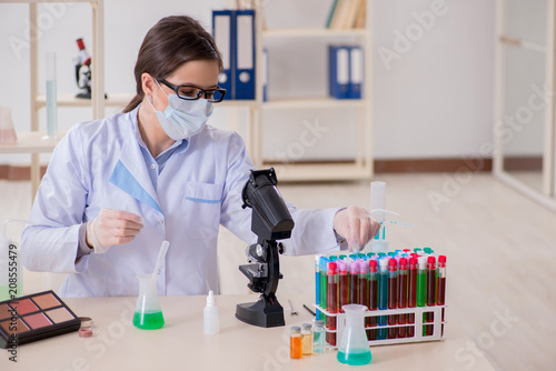 Lab chemist checking beauty and make-up products