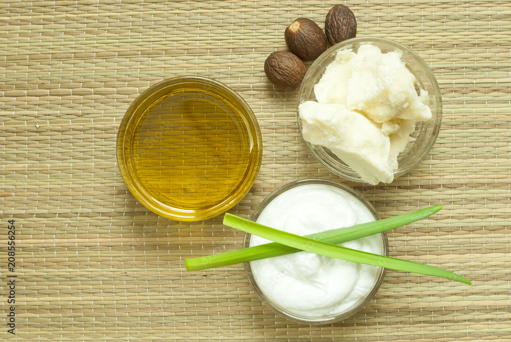 moisturizer, shea butter, essential oil, top view moisturizer, shea butter, essential oil, top view