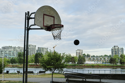 Wallpaper Mural Basketball court in urban area. Dusk, dramatic view. Vancouver BC, Canada Torontodigital.ca