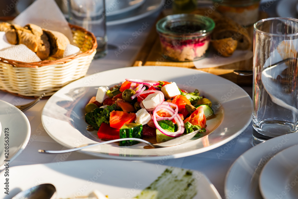 Different salads served at the celebratory table. Different salads served at the celebratory table.