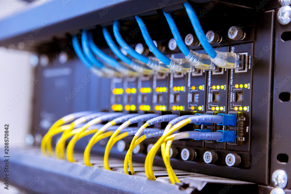 Fotografía Network switch and ethernet cables,Data Center Concept.
