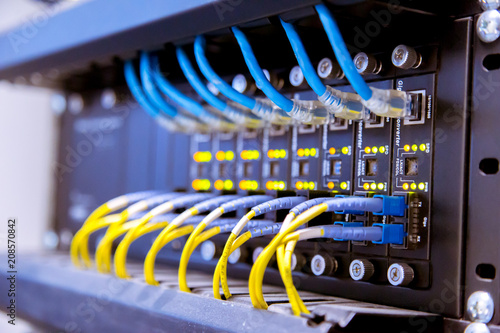 Tableau sur toile Network switch and ethernet cables,Data Center Concept.