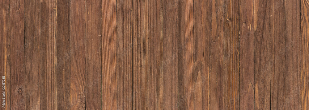 Naklejka premium Brown board, wood texture close-up. Wooden background in rustic style