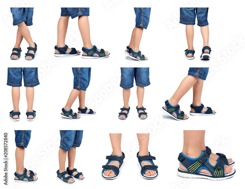 set of different Kids leather sandals on leg isolated on a white background