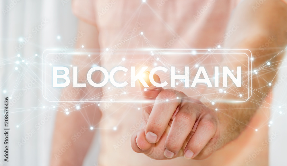 Businessman using blockchain cryptocurrency interface 3D rendering Businessman using blockchain cryptocurrency interface 3D rendering