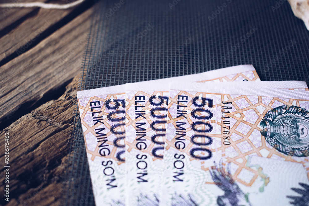 Obraz premium Currency of Uzbekistan.