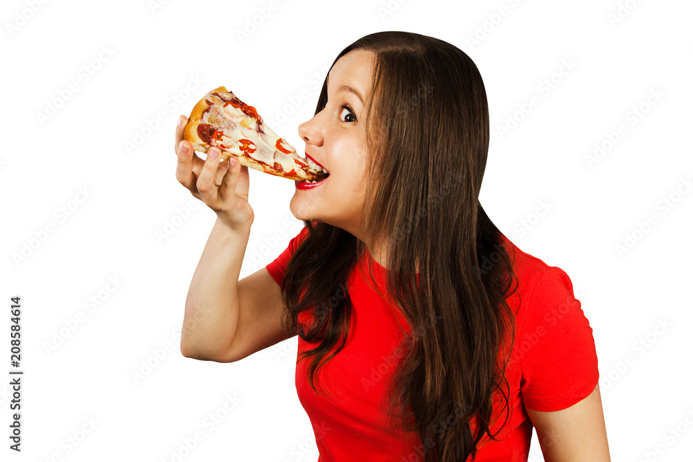 Young handsome girl eating pizza, isolated on white background. Side view. Young handsome girl eating pizza, isolated on white background. Side view.