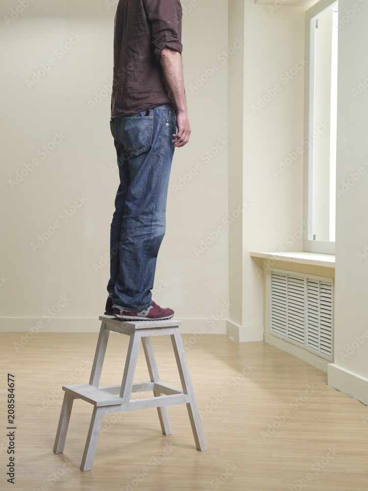 suicide illustration - man hanging himself in epmty room Stock-Foto | Adobe  Stock