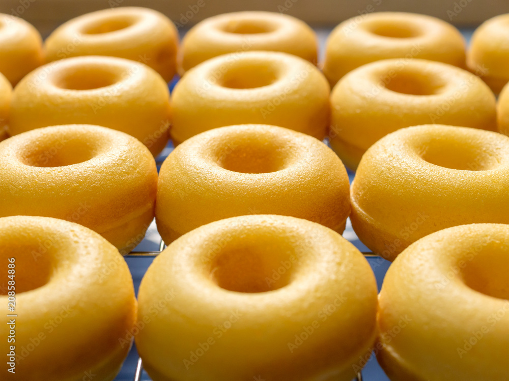 Close-up image of group of baked butter milk donuts