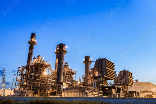 Gas turbine electrical power plant at dusk with twilight 