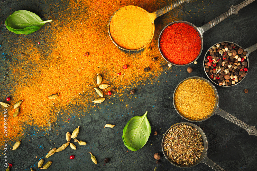Wooden table of colorful spices. Wooden table of colorful spices.