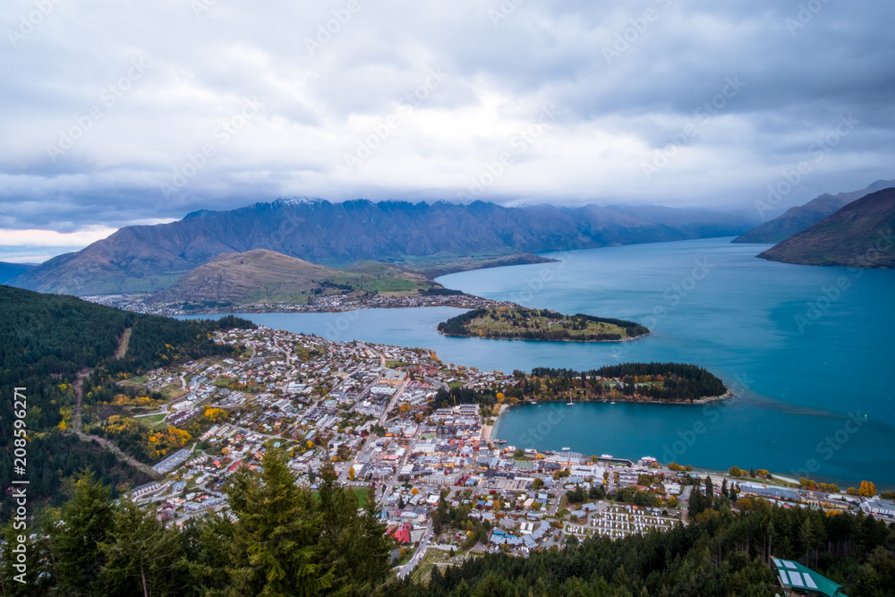 Landscape photography of Queenstown city during sunset time with cloudy scene.