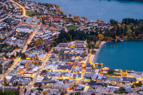 Long exposure photography, close-up, the traffic in Queenstown city during sunset time.