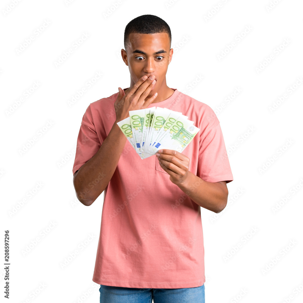 Young african american man taking a lot of money on isolated white background Young african american man taking a lot of money on isolated white background
