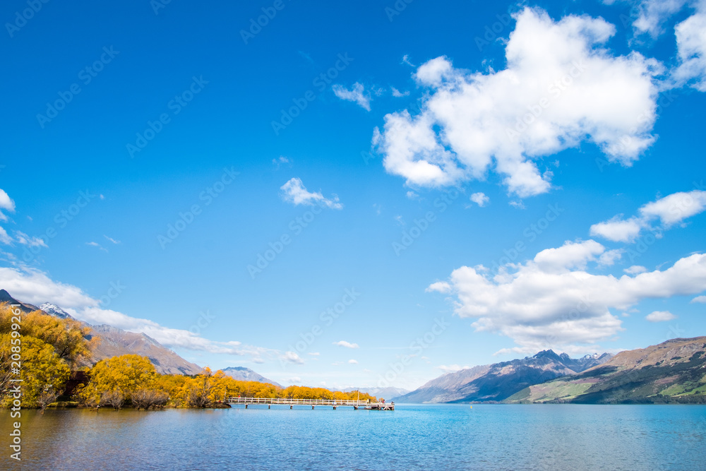 Beautiful landscape of Alps mountain and lake on a sunny day with blue sky.