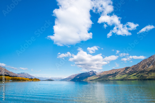 Beautiful landscape of Alps mountain and lake on a sunny day with blue sky.