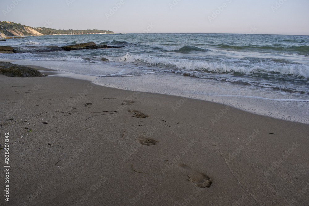 Beautiful view and waves on the beach in Varna, the sea capital of Bulgaria. What's better than sunny weather, sea and sight, waves and a nice company.