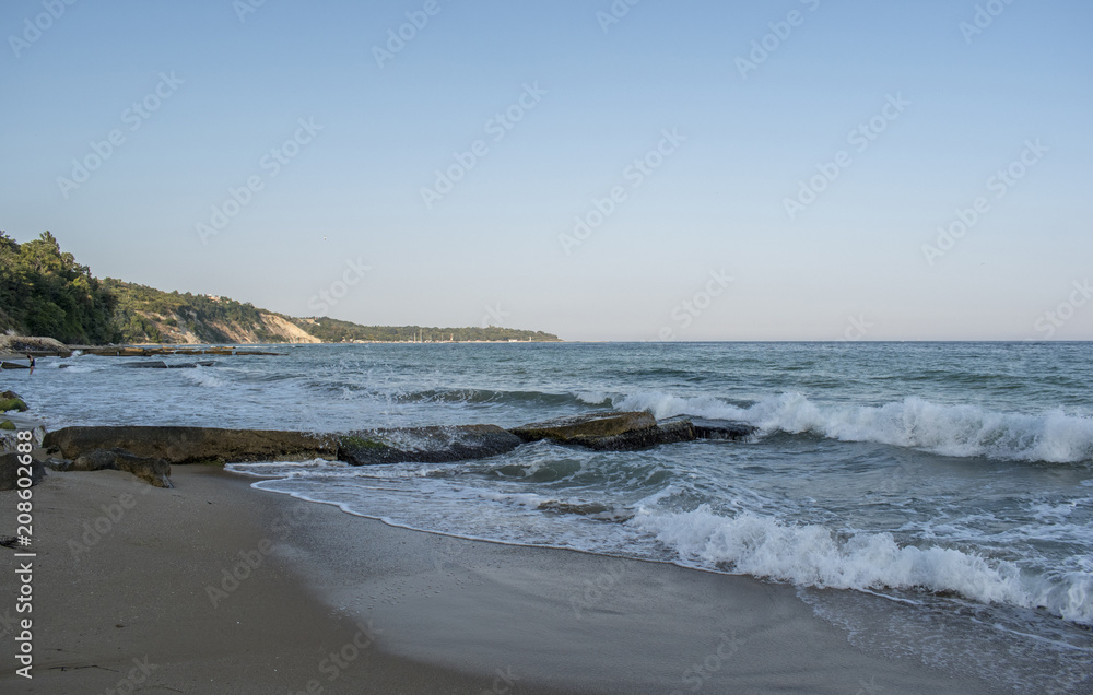 Beautiful view and waves on the beach in Varna, the sea capital of Bulgaria. What's better than sunny weather, sea and sight, waves and a nice company.